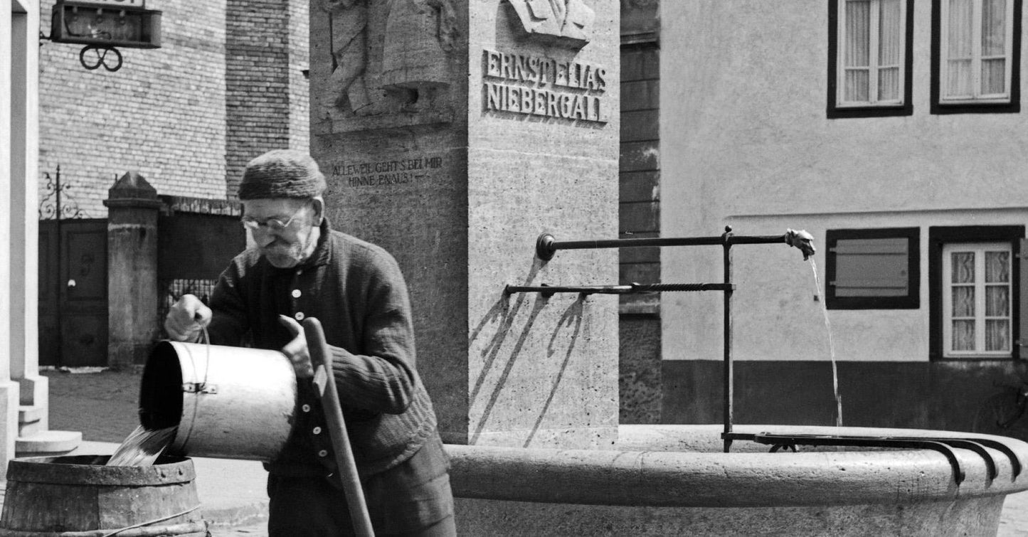 Man at Ernst Elias Niebergall Fountain Darmstadt, Germany, 1938, Printed 2021