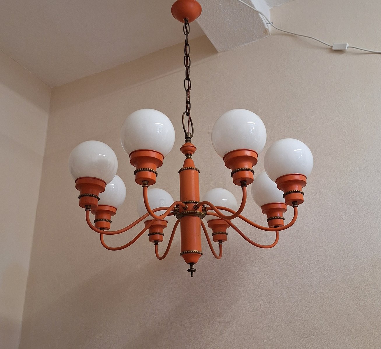 Mid-Century 8-Flame Chandelier with White Spherical Glass Shades on an Orange Frame, Set Off with Brass, 1960s