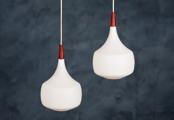 Mid-Century Danish Opaline Glass and Teak Pendant Lamps from Holmegaard, 1960s, Set of 2-ZGQ-712649