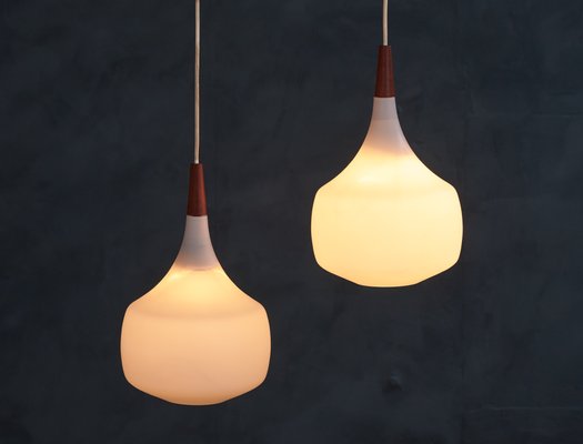 Mid-Century Danish Opaline Glass and Teak Pendant Lamps from Holmegaard, 1960s, Set of 2-ZGQ-712649