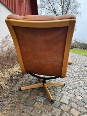 Mid-Century Delfin Swivel Chair in Cognac Brown Leather from Göte Möbler Nässjö, Sweden, 1970s-IJL-1824333