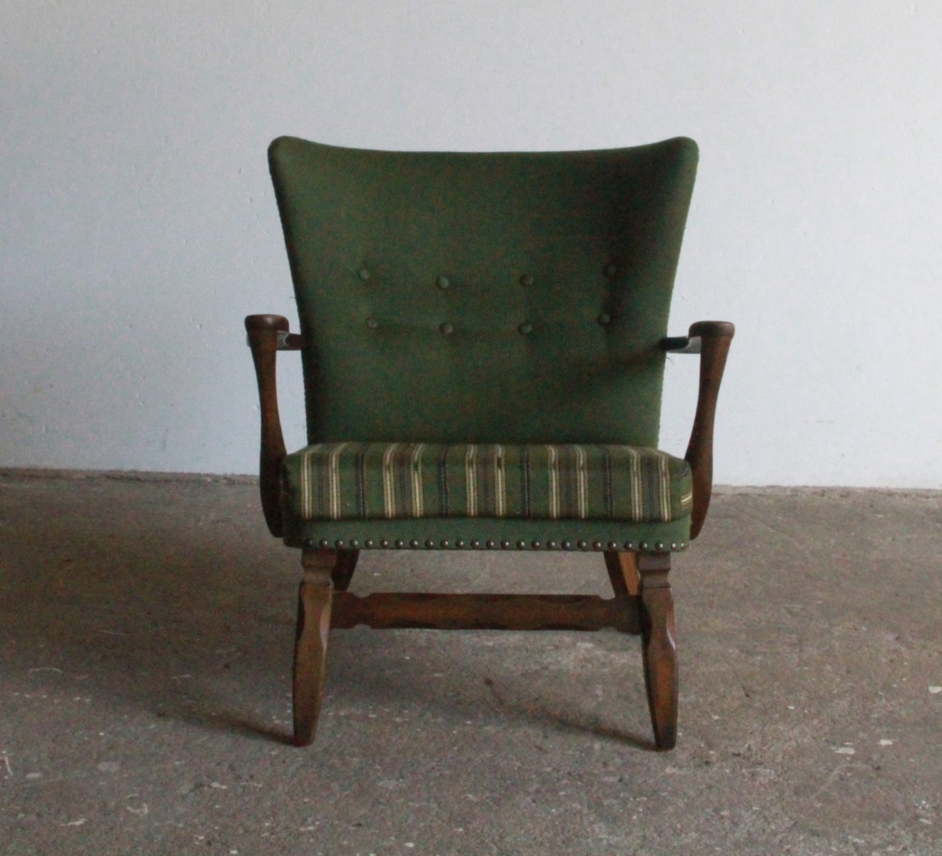 Mid-Century Lounge Chair in Dark Stained Oak in the style of of Viggo Boesen, 1950s