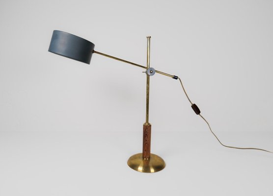 Mid-Century Modern Brass and Walnut Table Lamp attributed to Einar Bäckström, Sweden, 1950s-UYK-1772907