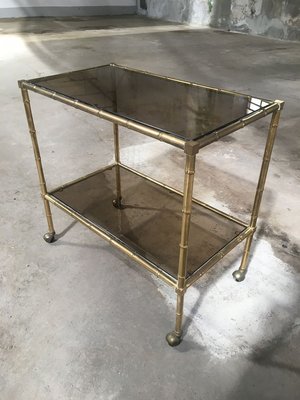 Mid-Century Modern French Gilt Metal & Faux Bamboo Bar Cart with Smoked Glasses by Maison Baguès, 1960s-DHH-932909