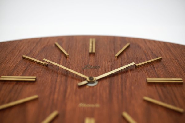 Mid-Century Modern Teak and Brass Wall Clock by Elexacta Schatz, Germany, 1960s-KQB-1417057