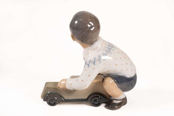 Model 1166 Boy with Car Figurine in Porcelain by Dahal Jensen, Denmark, 1950s-PCO-1813295