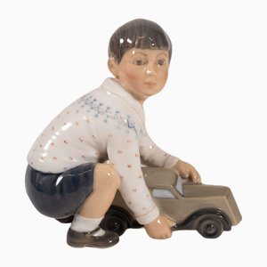 Model 1166 Boy with Car Figurine in Porcelain by Dahal Jensen, Denmark, 1950s-PCO-1813295