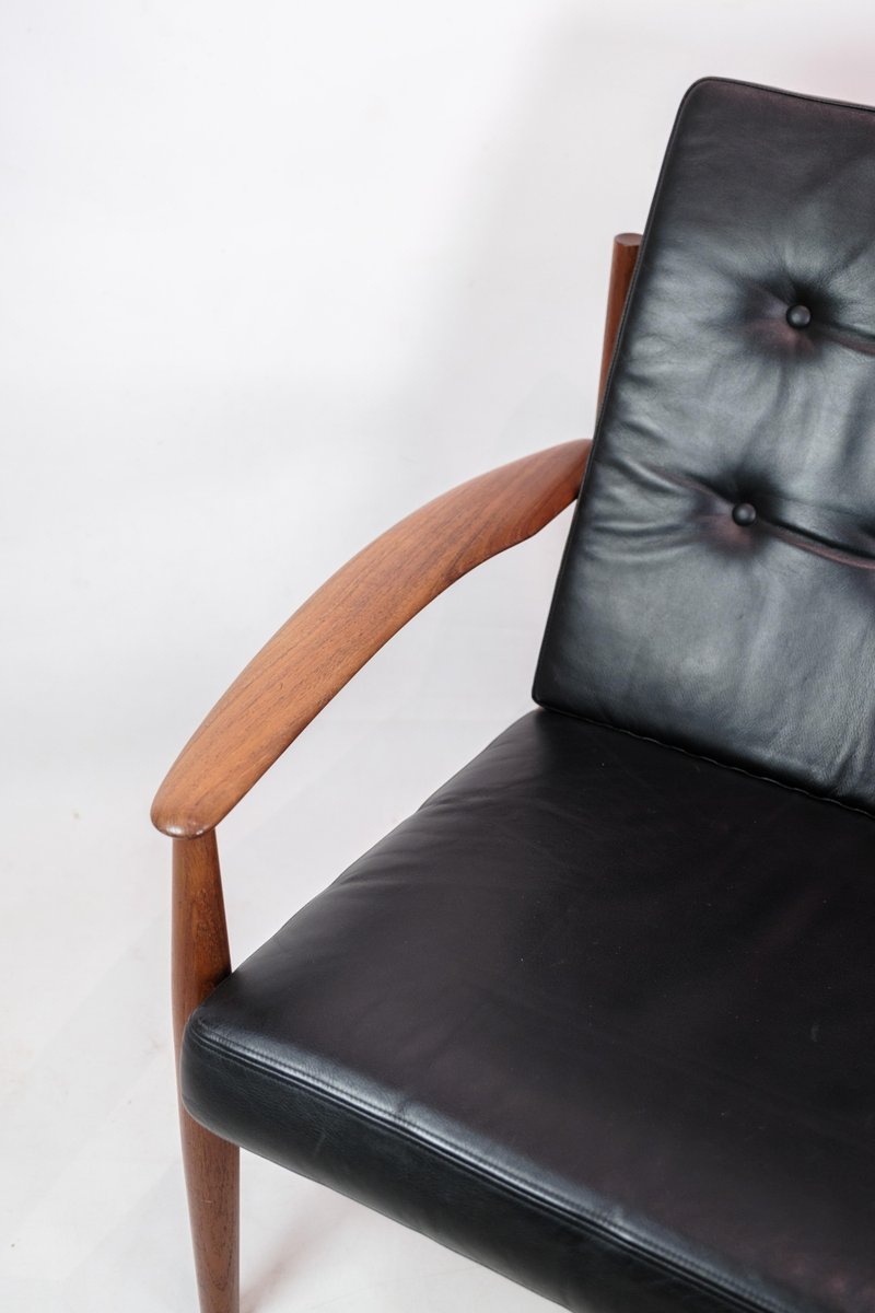 Model 118 Armchair in Teak and Black Leather by Grete Jalk, 1960s