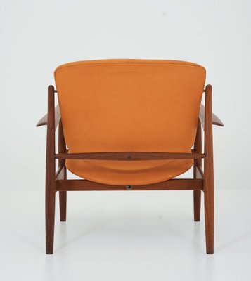 Model FD 136 Lounge Chair in Cognac Leather and Teak by Finn Juhl, 1970s-FM-1722763