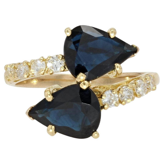 Modern Pear-Cut Sapphire, Diamonds and 18 Karat Yellow Gold You and Me Ring