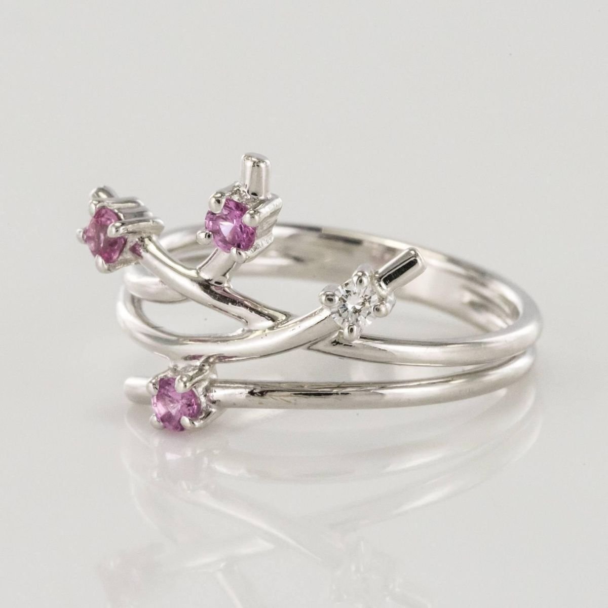 Modern Pink Sapphire Diamond Ring by Front