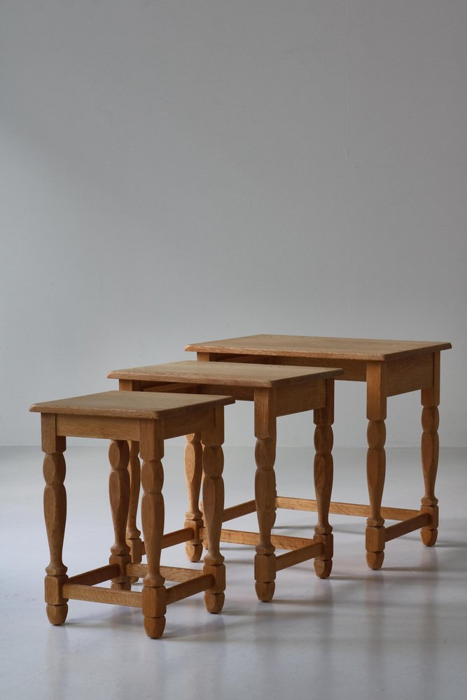 Nesting Tables attributed to Henning Kjærnulf in Quartersawn Oakwood, Denmark, 1960s, Set of 3