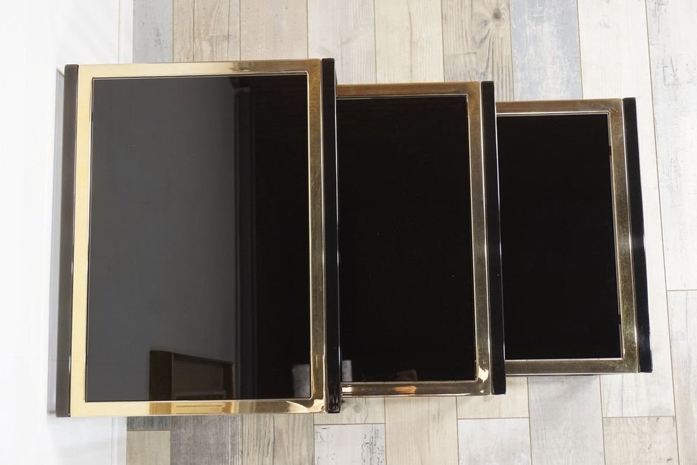 Nesting Tables in Black with Gold-Plated Metal Foot, 1970s, Set of 3