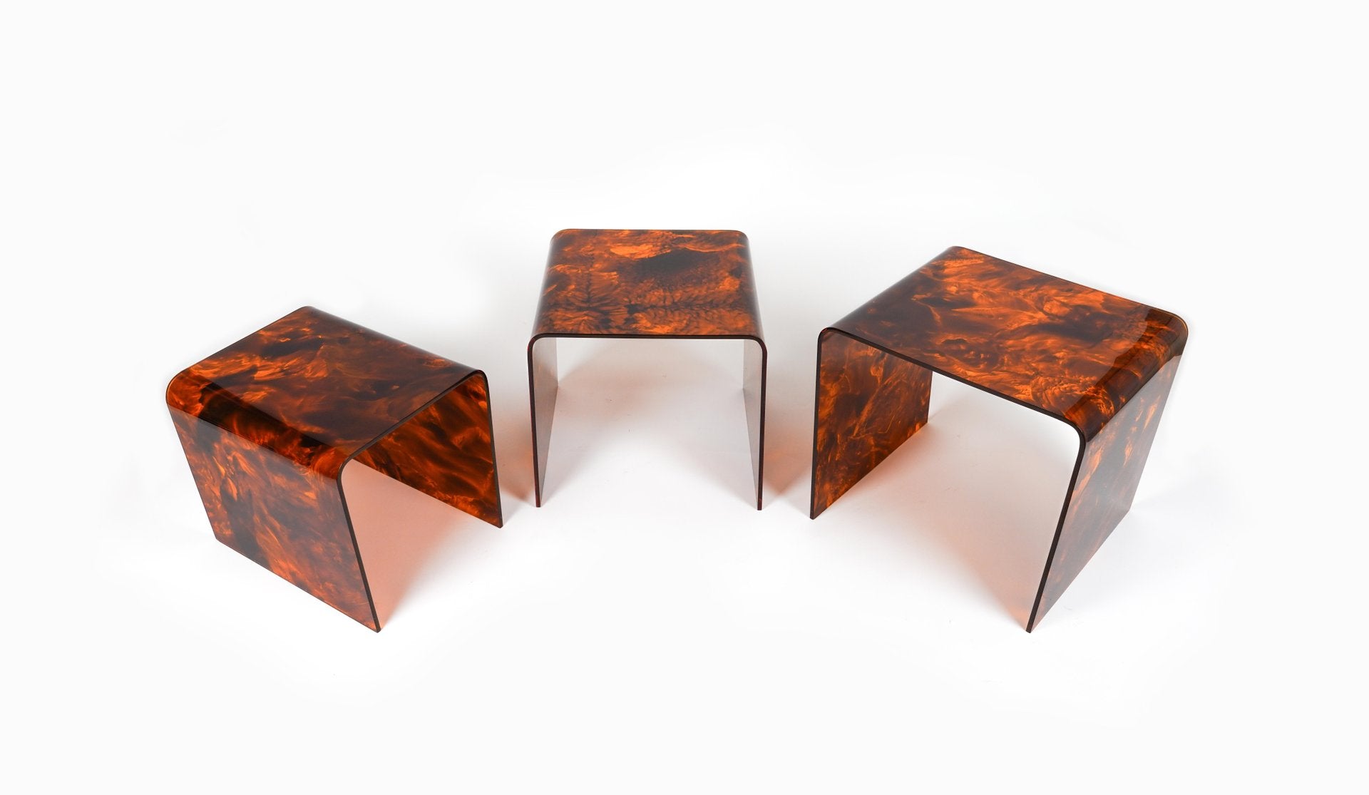 Nesting Tables in Faux Tortoiseshell Acrylic Glass in the style of Christian Dior, Italy, 1970s, Set of 3