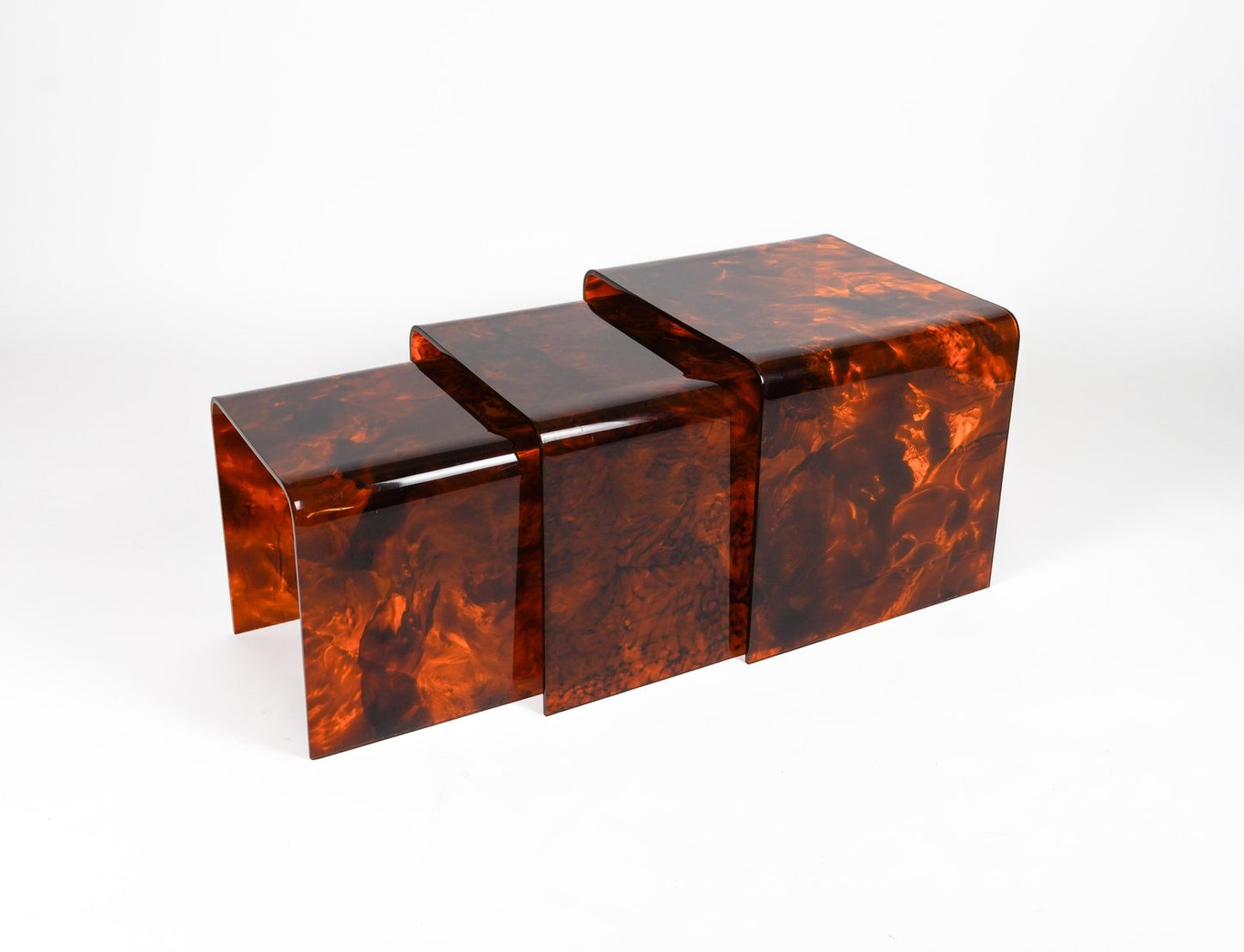 Nesting Tables in Faux Tortoiseshell Acrylic Glass in the style of Christian Dior, Italy, 1970s, Set of 3