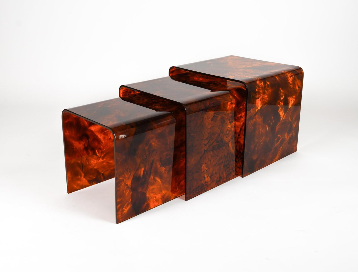 Nesting Tables in Faux Tortoiseshell Acrylic Glass in the style of Christian Dior, Italy, 1970s, Set of 3