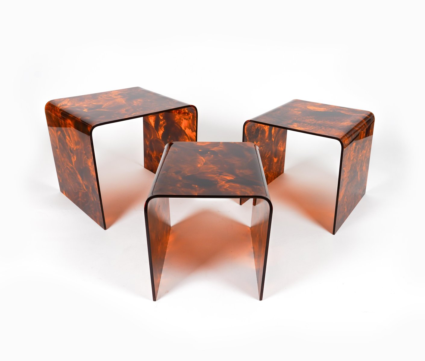 Nesting Tables in Faux Tortoiseshell Acrylic Glass in the style of Christian Dior, Italy, 1970s, Set of 3