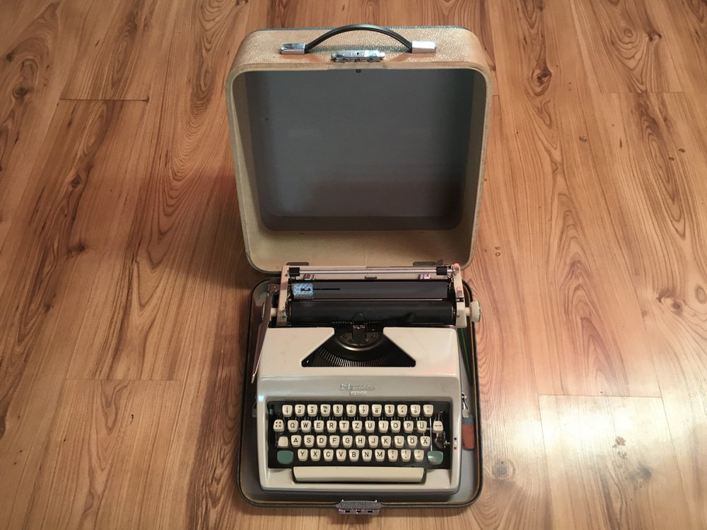 Olympia Monica Typewriter with Suitcase, 1960s