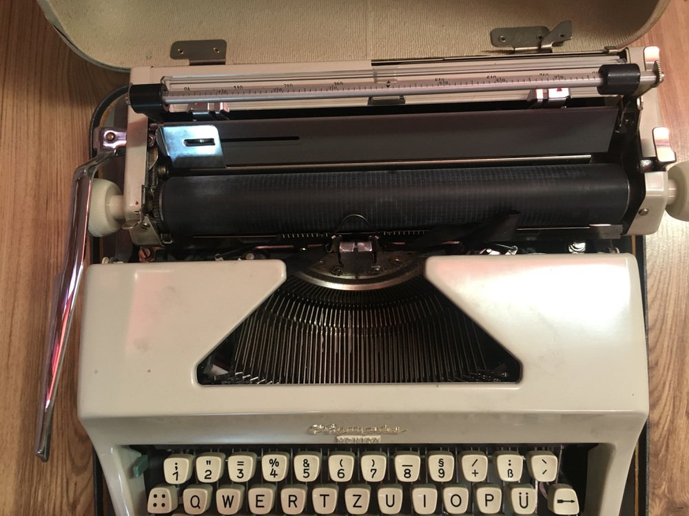 Olympia Monica Typewriter with Suitcase, 1960s