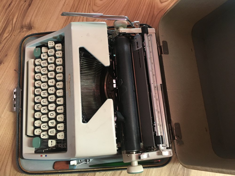 Olympia Monica Typewriter with Suitcase, 1960s