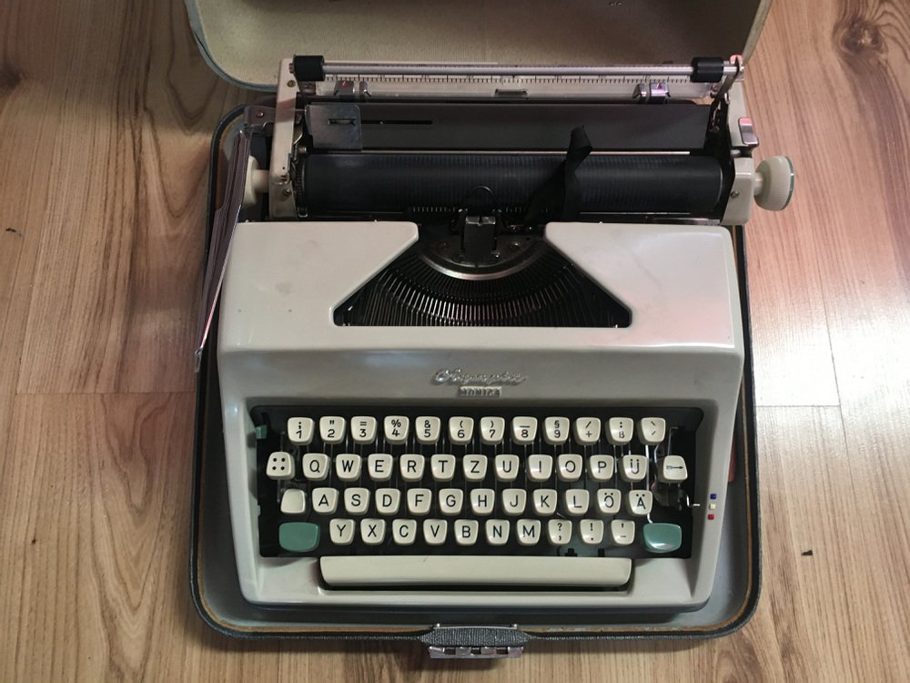 Olympia Monica Typewriter with Suitcase, 1960s