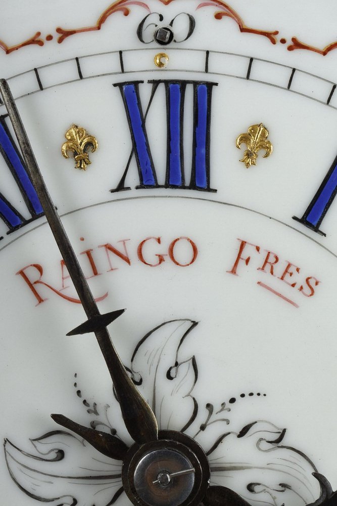 Ormulu and Chased Bronze Rock Clock from Raingo et Freres