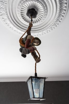 Pendant Light with Hand Carved Mountain Climber Sculpture and Lantern, 1930s-KEG-1718796