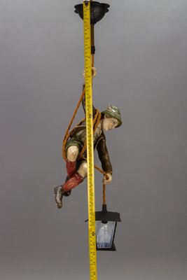 Pendant Light with Hand Carved Mountain Climber Sculpture and Lantern, 1930s-KEG-1718796