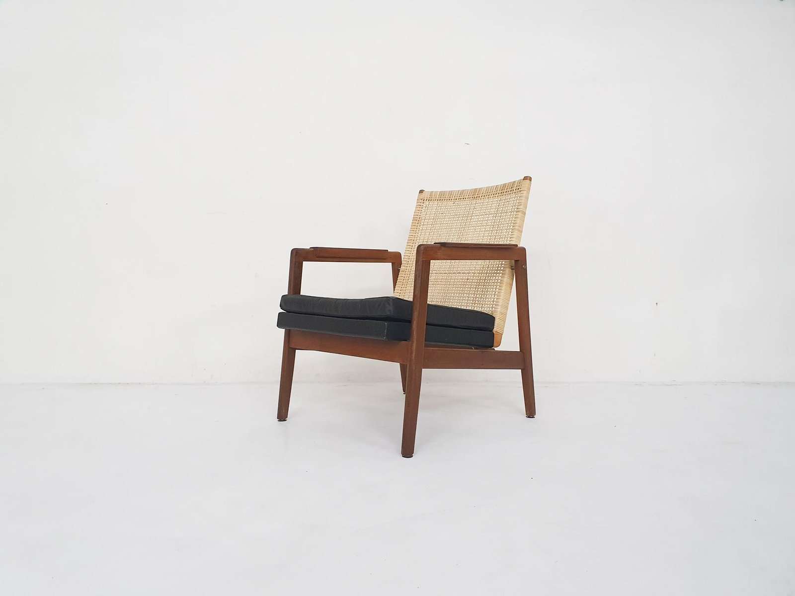 Rattan and Leather Low-Back Lounge Chair by P. J. Muntendam for Gebrüder Jonkers, Netherlands, 1950s