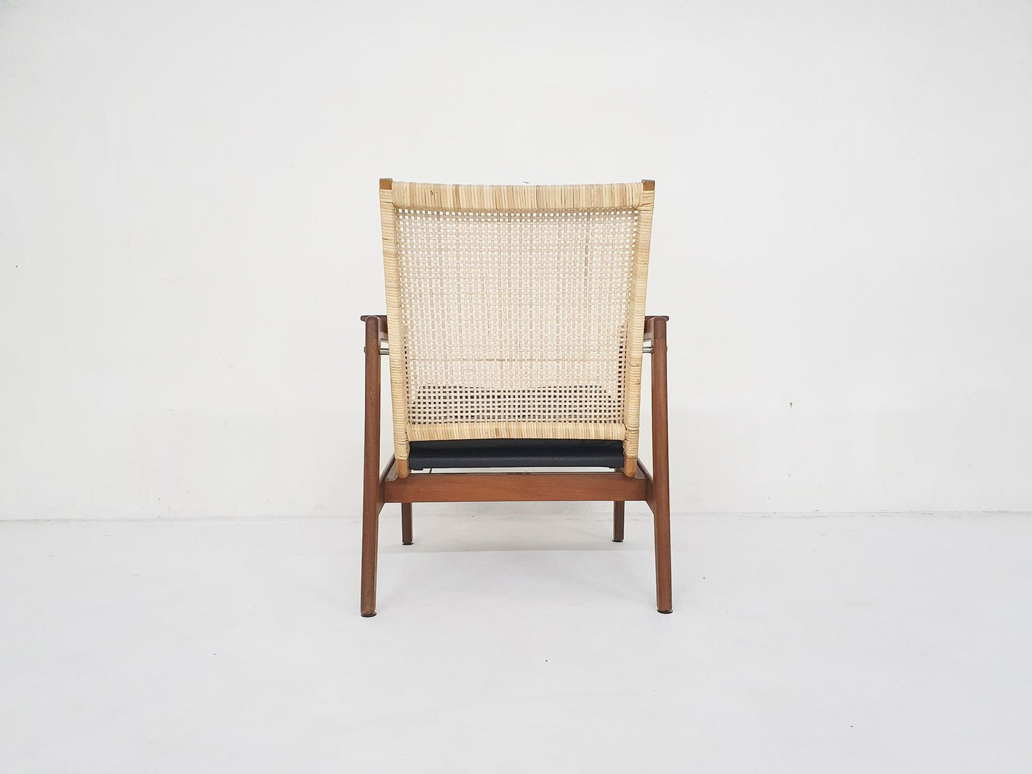 Rattan and Leather Low-Back Lounge Chair by P. J. Muntendam for Gebrüder Jonkers, Netherlands, 1950s