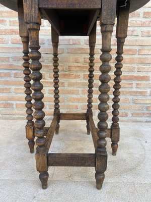 Round Folding Center Oak Table with Carved Top and Solomonic Legs, 1940s-NOU-1752709