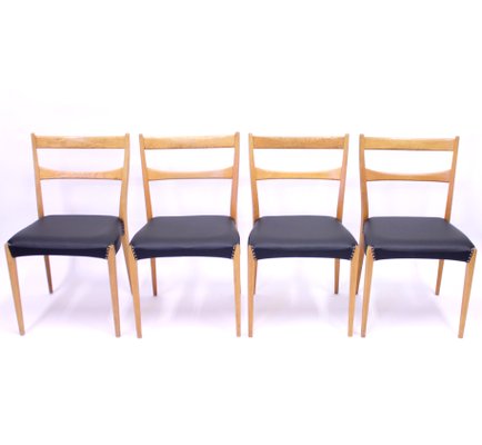 Scandinavian Oak Dining Chairs With Black Leather Seats, 1950s, Set of 4-KQ-787374