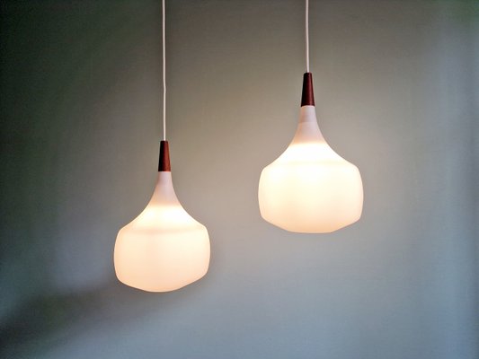 Scandinavian Pendant Lights in Teak and White Opaline Glass from Holmegaard, 1960s, Set of 2-FAX-2035873