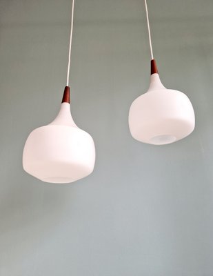 Scandinavian Pendant Lights in Teak and White Opaline Glass from Holmegaard, 1960s, Set of 2-FAX-2035873