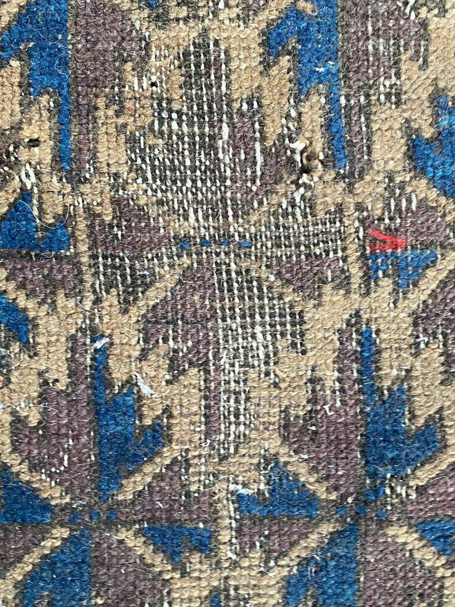 Small Antique Distressed Baluch Rug