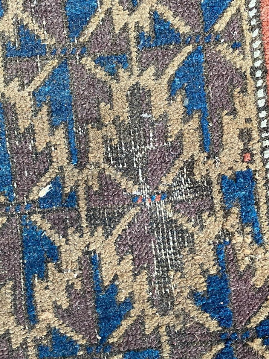 Small Antique Distressed Baluch Rug