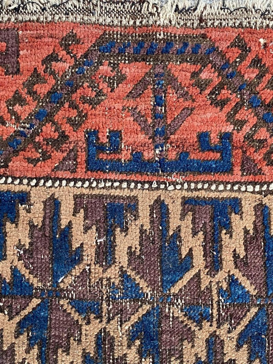 Small Antique Distressed Baluch Rug