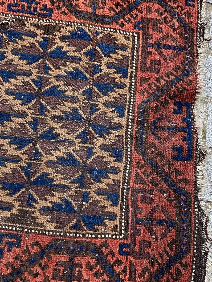 Small Antique Distressed Baluch Rug