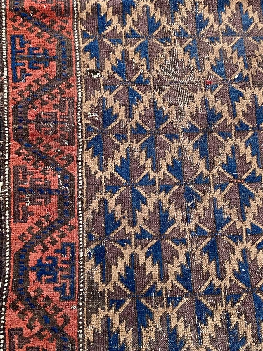 Small Antique Distressed Baluch Rug