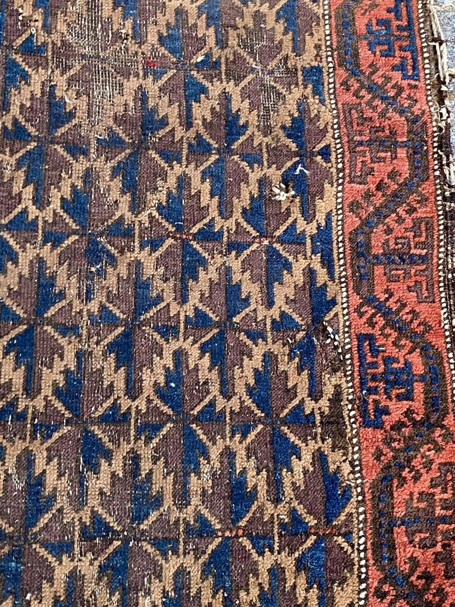 Small Antique Distressed Baluch Rug