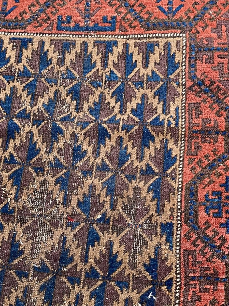 Small Antique Distressed Baluch Rug