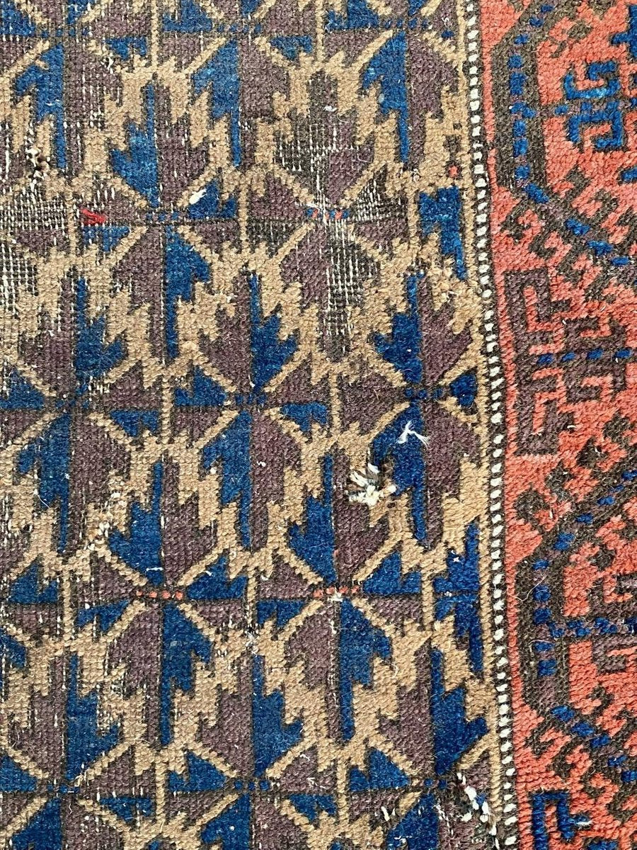 Small Antique Distressed Baluch Rug