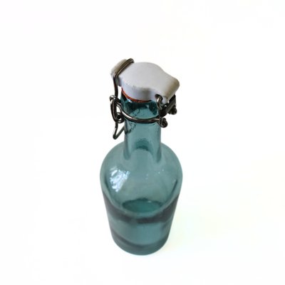 Small Green Glass Bottle with Porcelain Lid from Årnäs, Sweden, Early 1900s-JKV-1795734