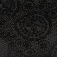 Enamelled lava stone with anthracite decoration