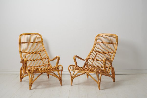 Swedish Modern Rattan Lounge Chairs and Footstool attributed to Bruno Mathsson for Dux, 1970s, Set of 3-MJF-1772916