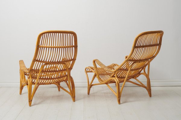 Swedish Modern Rattan Lounge Chairs and Footstool attributed to Bruno Mathsson for Dux, 1970s, Set of 3-MJF-1772916