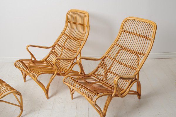 Swedish Modern Rattan Lounge Chairs and Footstool attributed to Bruno Mathsson for Dux, 1970s, Set of 3-MJF-1772916