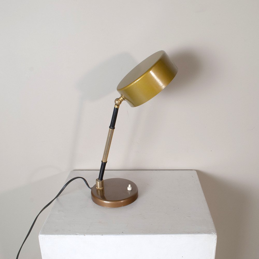 Table Lamp in Worked and Chromed Metal and Steal Steal in Brass in the style of Oscar Torlasco, 1960s