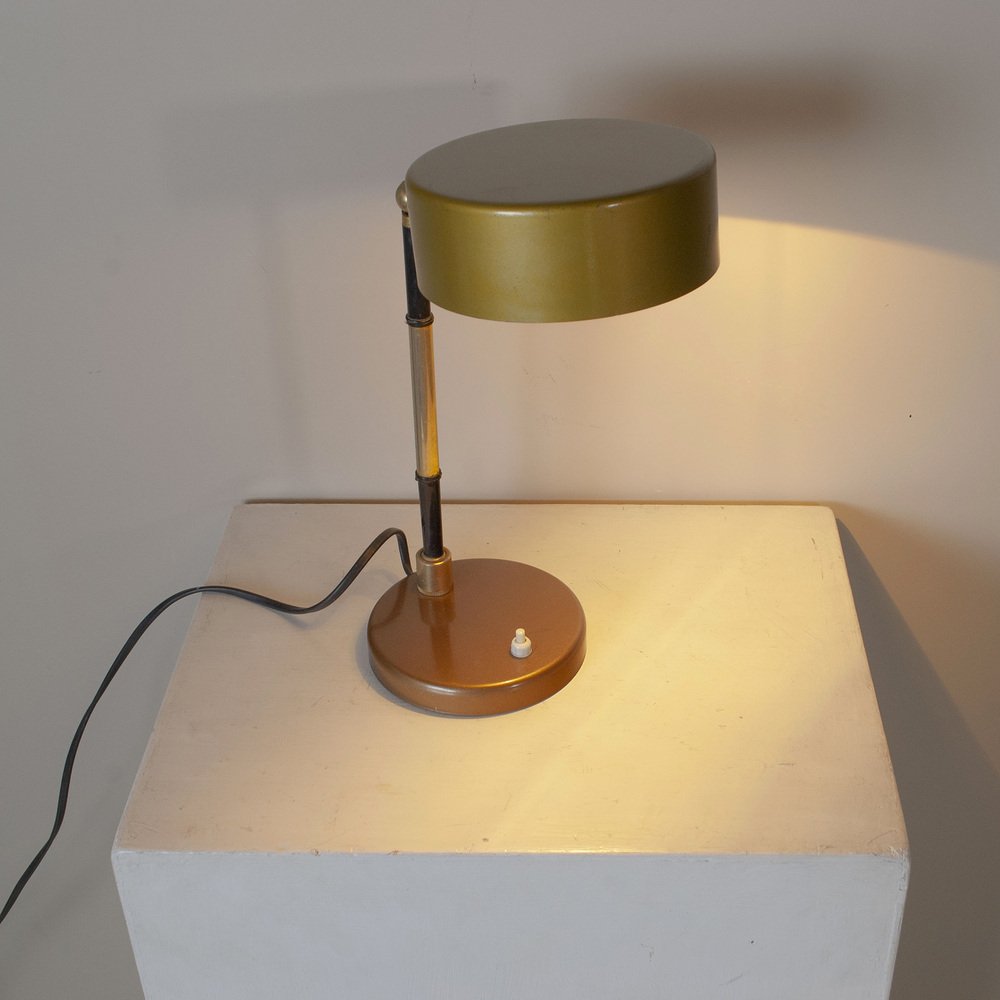 Table Lamp in Worked and Chromed Metal and Steal Steal in Brass in the style of Oscar Torlasco, 1960s