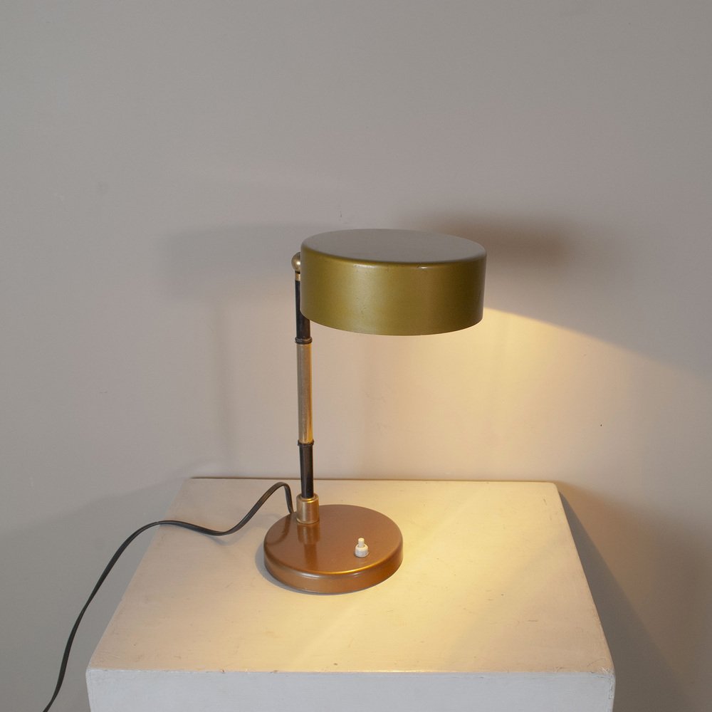 Table Lamp in Worked and Chromed Metal and Steal Steal in Brass in the style of Oscar Torlasco, 1960s